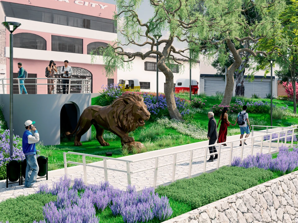 Escultura de un león sobre el césped, entre lavandas y árboles, junto a una vereda con barandas blancas.